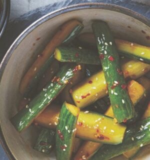 a bowl of pickled sesame cucumbers that are crunchy and light