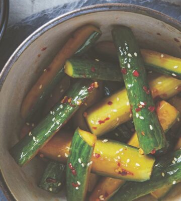 a bowl of pickled sesame cucumbers that are crunchy and light