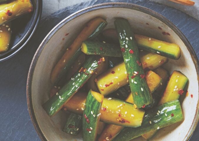 a bowl of pickled sesame cucumbers that are crunchy and light