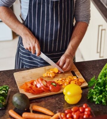 person preparing vegetables
