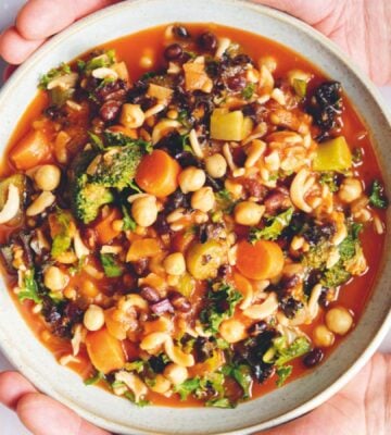 an Ikarian longevity stew filled with beans, chickpeas, lentils, kale, broccoli, part of recipes containing five vegetables or more