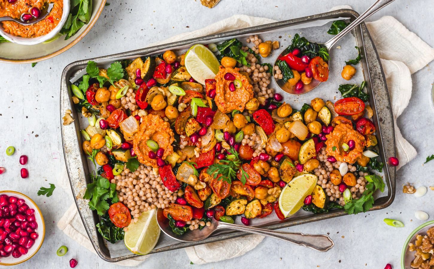 a picture of a red pepper pesto chickpea traybake