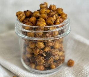 A glass jar of spiced chickpeas