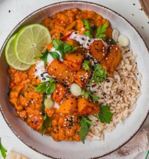 a bowl of creamy roasted butternut squash and spinach dahl