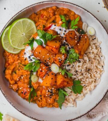 a bowl of creamy roasted butternut squash and spinach dahl