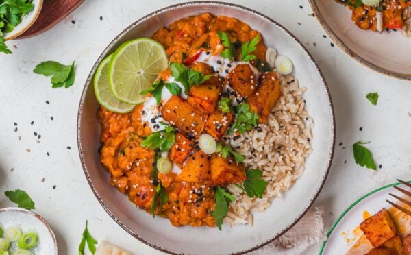 a bowl of creamy roasted butternut squash and spinach dahl