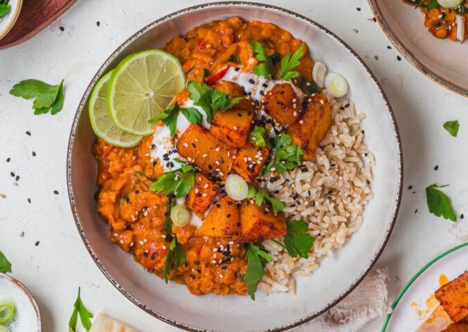 a bowl of creamy roasted butternut squash and spinach dahl