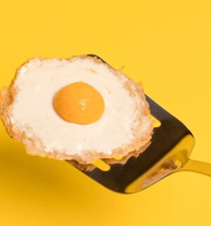 a vegan fried egg with a potato egg white and a sweet potato yolk