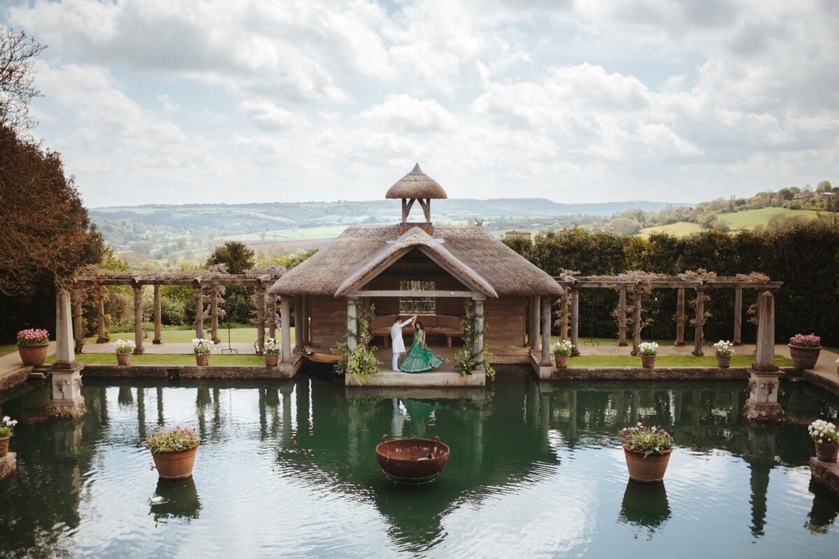 An aerial photo of Klaus and Kamal at their countryside vegan wedding