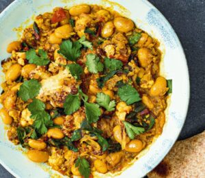 cauliflower butter bean & chard dahl with ginger and curry spices
