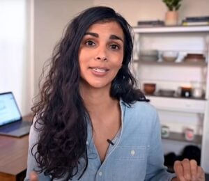 Plant-based YouTuber Nisha Vora in a still from her video on common mistakes vegans make