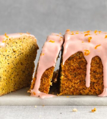 gluten-free poppy seed tea cake with raspberry cream cheese icing