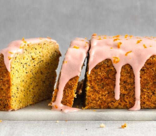 gluten-free poppy seed tea cake with raspberry cream cheese icing