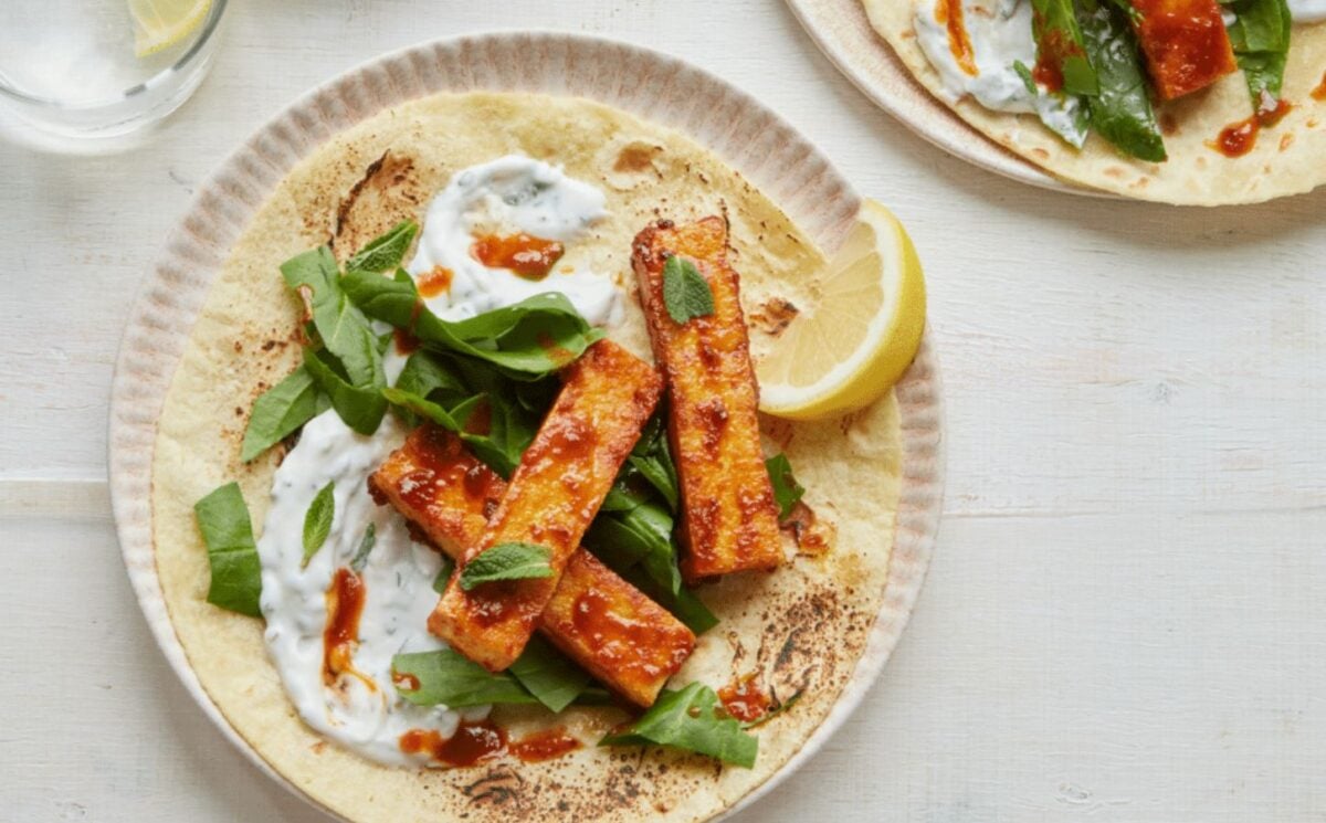vegan harissa tofu wrap with spinach, mint, and coconut yogurt