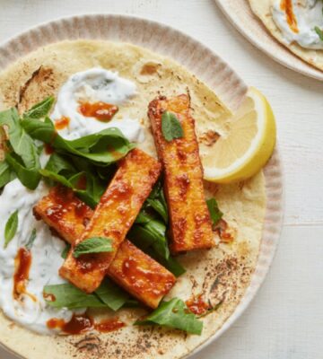 vegan harissa tofu wrap with spinach, mint, and coconut yogurt