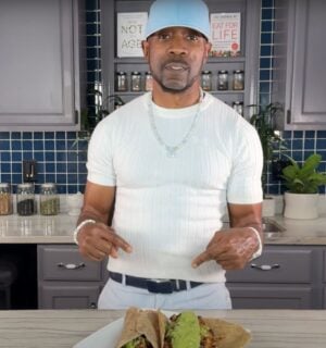 Plant-based YouTuber Javant B in a still from a video showcasing his wfpb healthy burrito recipe