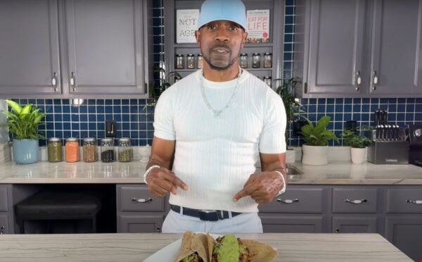 Plant-based YouTuber Javant B in a still from a video showcasing his wfpb healthy burrito recipe