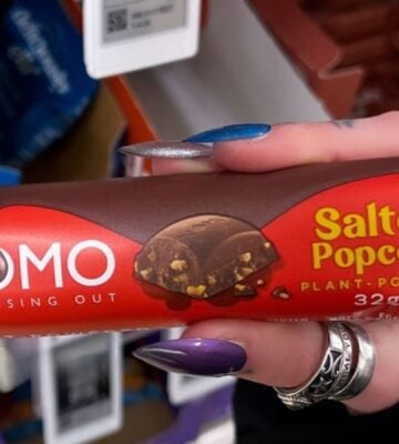 Photo shows one of the new NOMO vegan chocolate bar flavors, "Salted Popcorn"