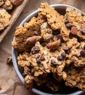 vegan oatmeal cookie granola with dairy free chocolate chips, almond butter, and seeds