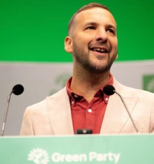 Photo shows Zack Polanski, the deputy leader of the Green Party, at a speaking event