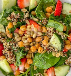 strawberry quinoa salad with chickpeas, kale, and spinach