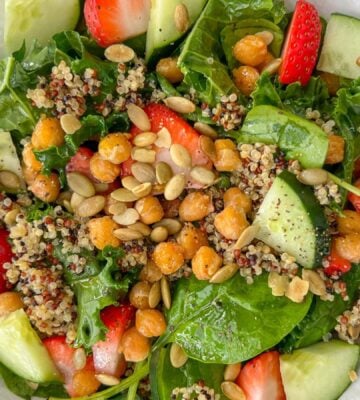 strawberry quinoa salad with chickpeas, kale, and spinach