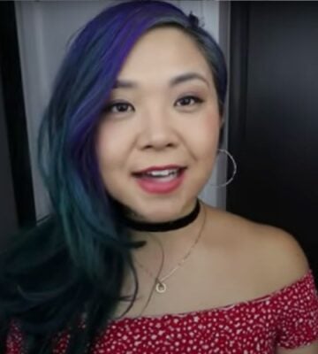 YouTuber Rose Lee (Cheap Lazy Vegan) in a still from her video about tofu recipes using the ultimate tofu hack