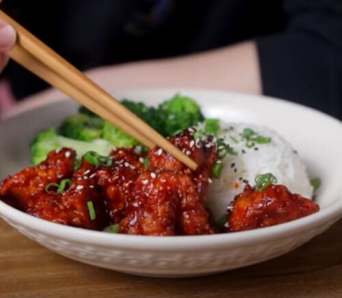 A bowl of gochujang tofu from a video on tofu recipes