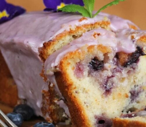 a lemon blueberry drizzle cake perfect for a list of vegan cakes to make this weekend