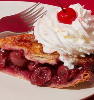 vegan cherry pie with sour cherries and vegan whipped cream