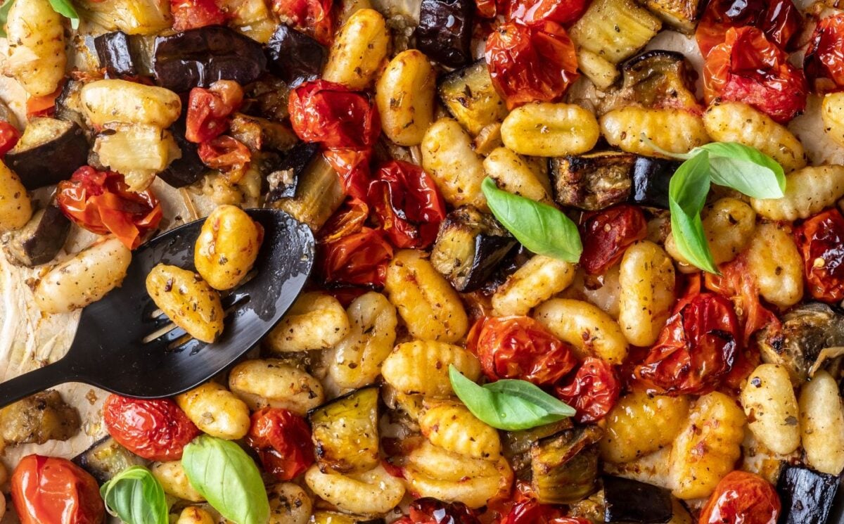 a sheet pan gnocchi alla norma with eggplant. basil, tomato, and gnocchi for vegan family dinner ideas
