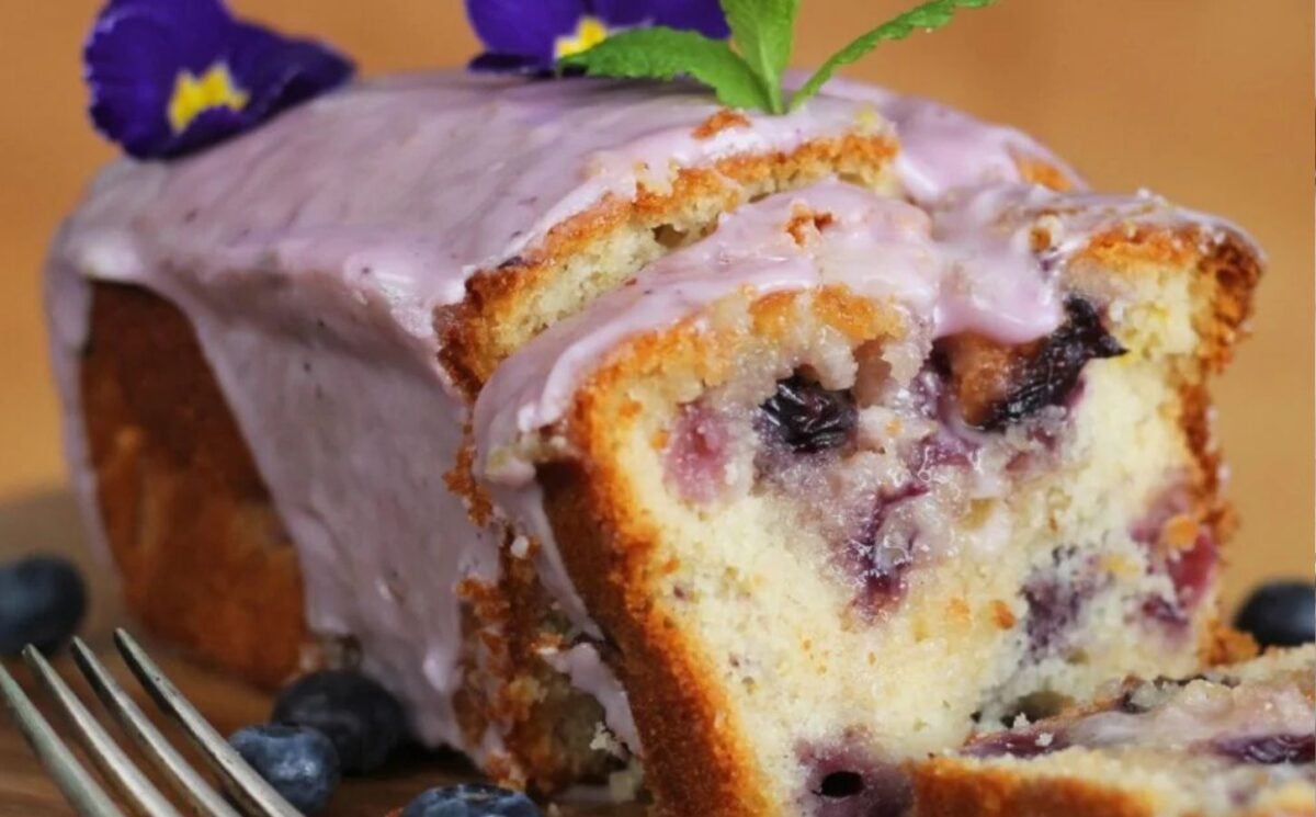 a lemon blueberry drizzle cake perfect for a list of vegan cakes to make this weekend