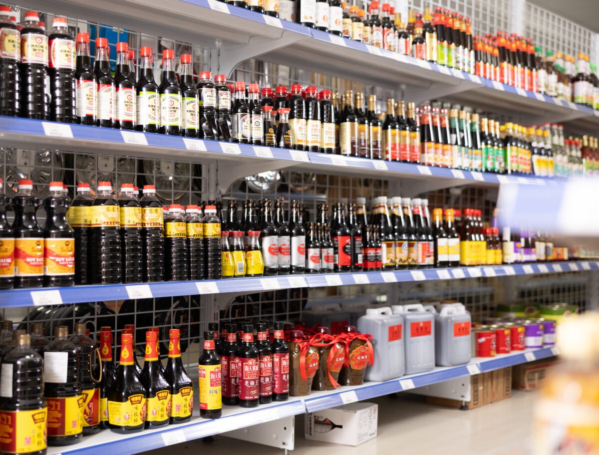 Photo shows supermarket shelves filled with soy sauce bottles produced by different brands