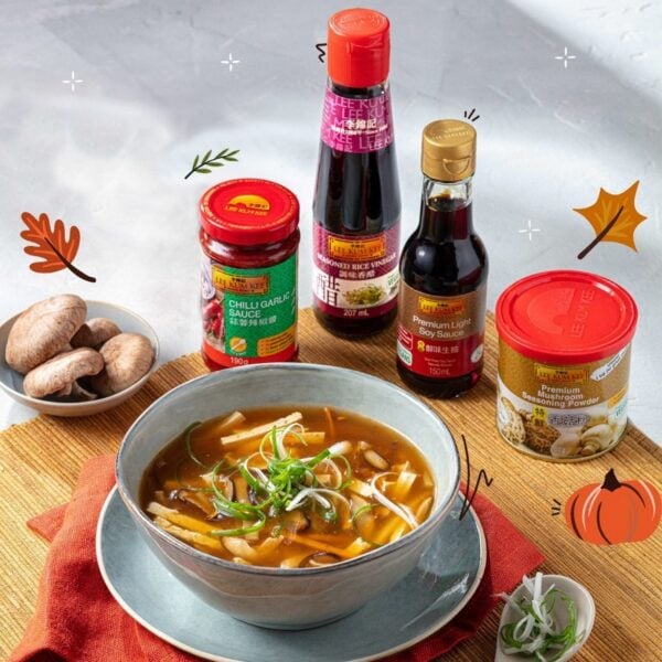 Photo shows a bowl of soup alongside several Lee Kum Lee products, including soy sauce