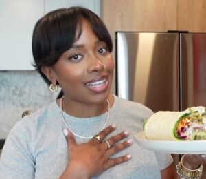 Shakayla Felice showing three high-protein vegan lunch wraps to eat