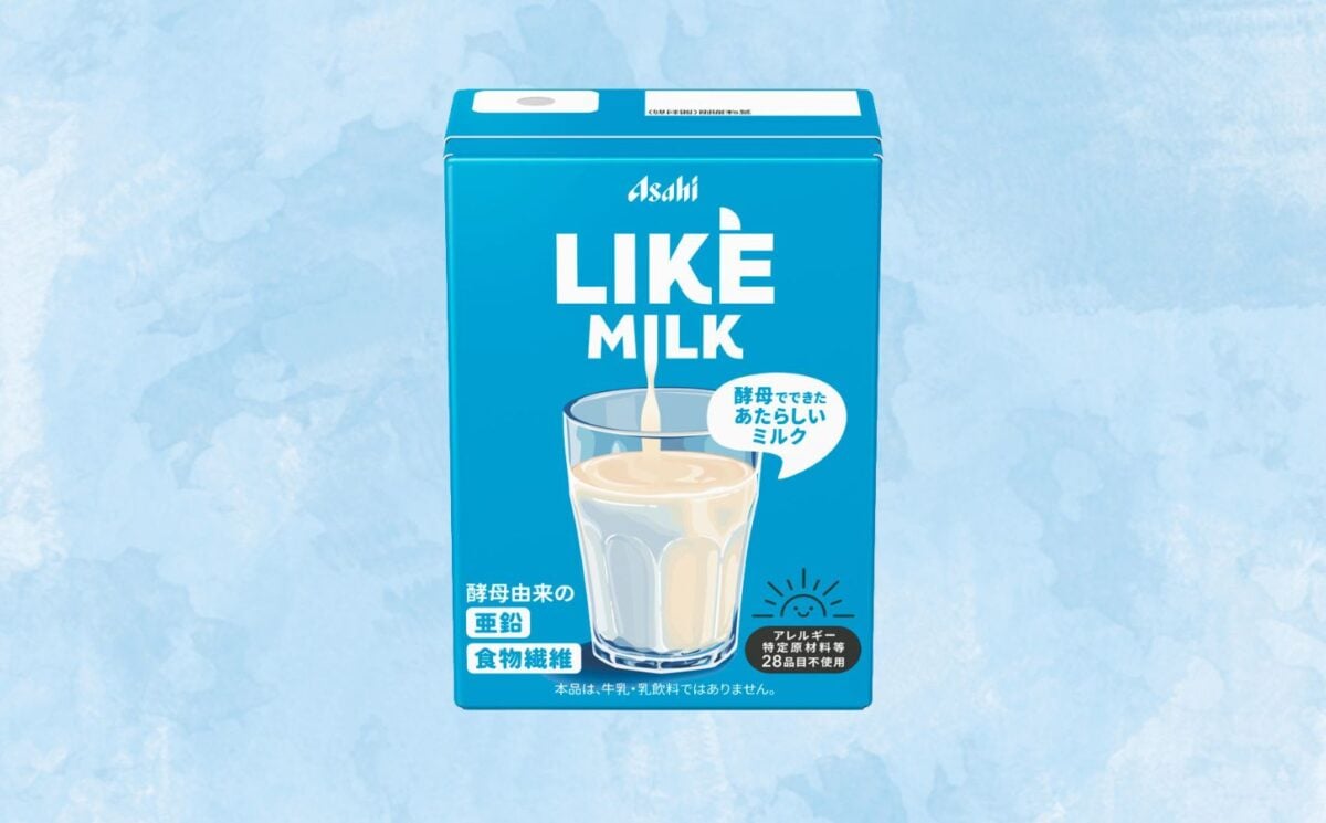 A carton of Asahi dairy-free milk in front of a blue background