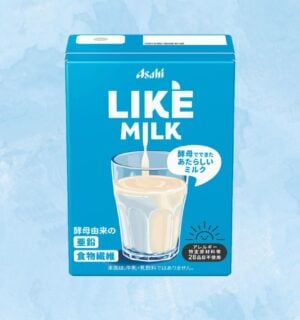A carton of Asahi dairy-free milk in front of a blue background