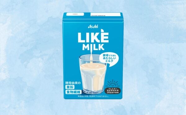 A carton of Asahi dairy-free milk in front of a blue background