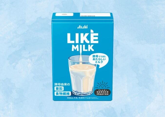 A carton of Asahi dairy-free milk in front of a blue background
