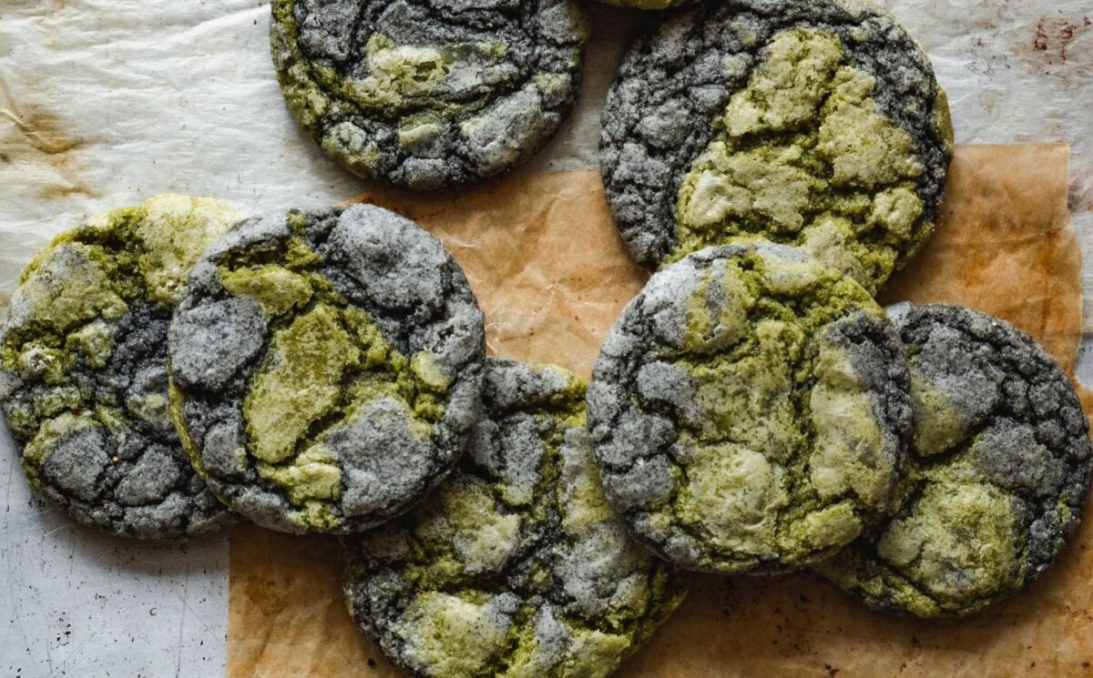 black sesame seed and matcha cookies laid out on a table