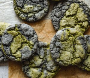 black sesame seed and matcha cookies laid out on a table