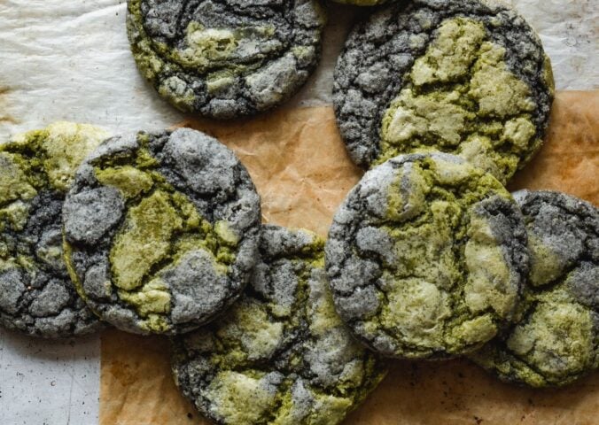 black sesame seed and matcha cookies laid out on a table
