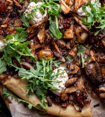 a caramelized shallot and wild mushroom pizza with dates and arugula