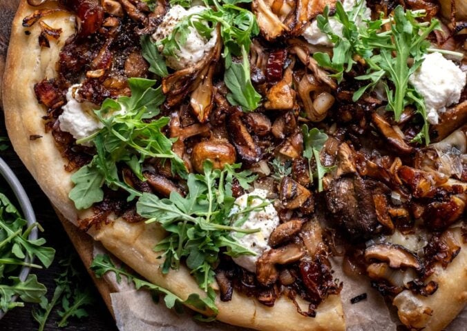 a caramelized shallot and wild mushroom pizza with dates and arugula