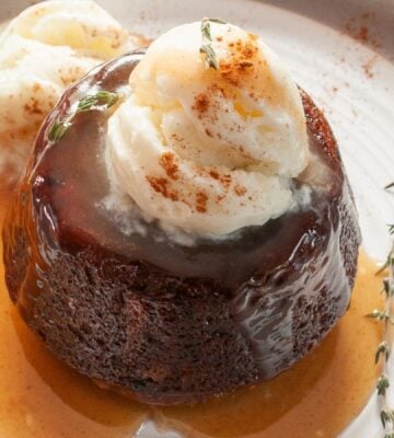carrot cake sticky toffee pudding with vegan ice cream on top