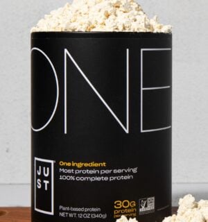 Photo shows a tub of Eat Just's new Just One vegan protein powder