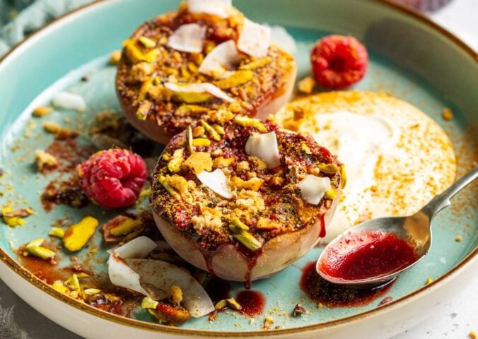 Vegan grilled peaches with a cream and biscuit topping