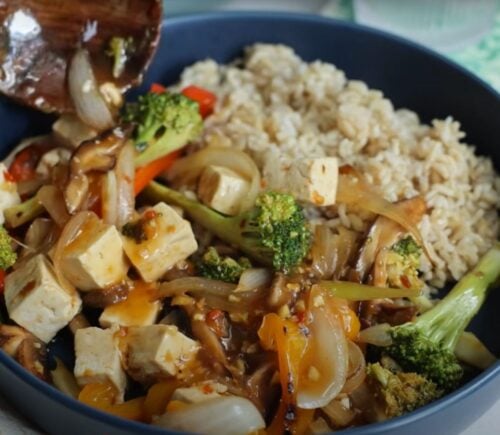 A tofu stir fry with vegetables and brown rice, a high fiber recipe