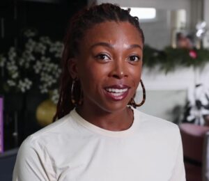 a picture of Jenne Claiborne explaining how to get enough daily vegan protein