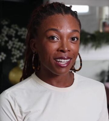 a picture of Jenne Claiborne explaining how to get enough daily vegan protein